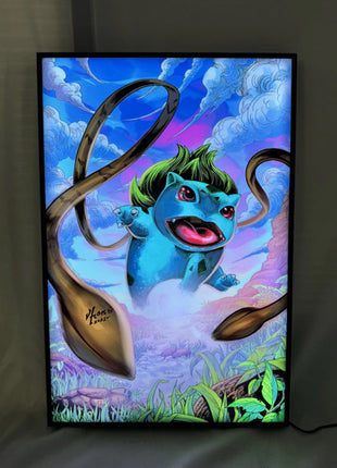  Slim frame RGB LED lightbox displaying Bulbasaur Pokémon artwork illuminated with bright, even lighting, ideal for gaming rooms and collector spaces, Snapping Turtle Gallery.