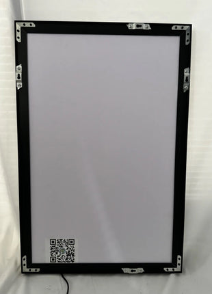 Back view of slim frame RGB LED acrylic lightbox showing mounting hardware and power cord setup, ready for wall installation, Snapping Turtle Gallery.