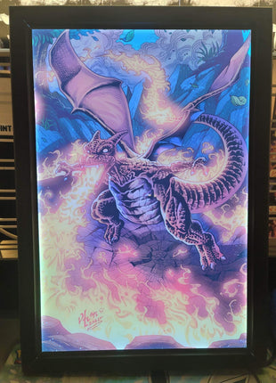 Charizard Pokémon artwork displayed in RGB LED acrylic lightbox frame with fiery glow, perfect for collectors and gaming room displays, Snapping Turtle Gallery.