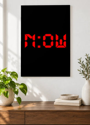 Right Now Digital acrylic wall art displayed above a wooden console with plants and books against a white wall.