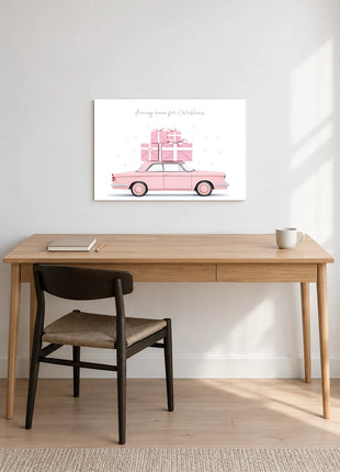 Rose-Colored Homecoming wall art displayed above a wooden desk against a white wall