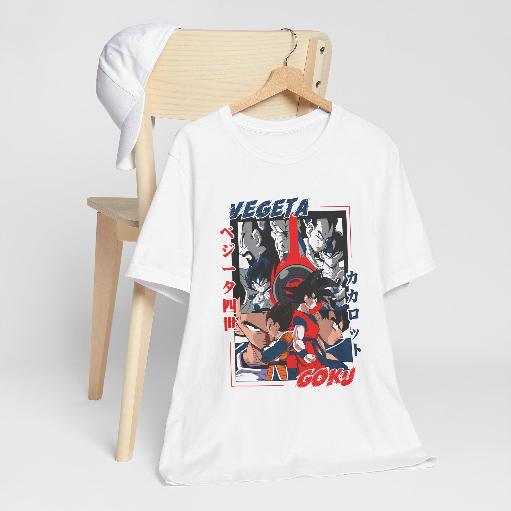 Alt: Saiyan Rivalry Anime Shirt on white, hanging on chair with cap, lifestyle display by Snapping Turtle Gallery

