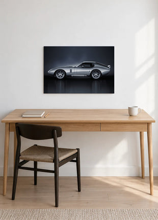 Silver Slipstream shown as horizontal acrylic wall art above a wooden desk with a notebook, pencil and white mug.