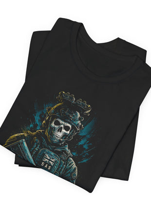 Folded black T-shirt detail showing the skull mask, raised night-vision optics and small Union Jack chest patch.
