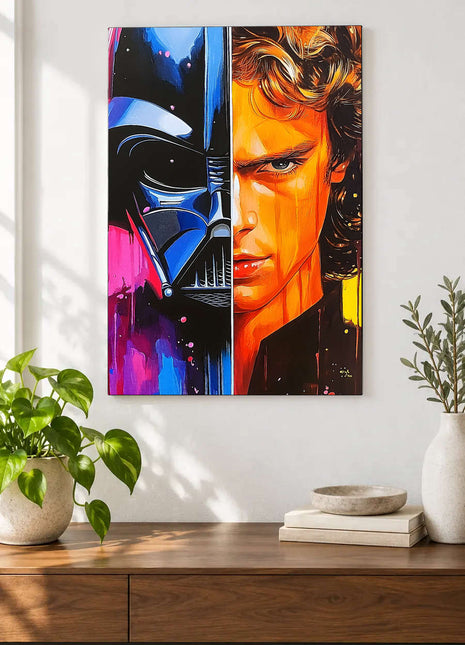 Vader and Anakin split portrait in black, blue, hot pink and orange paint displayed above a console table in a room setting