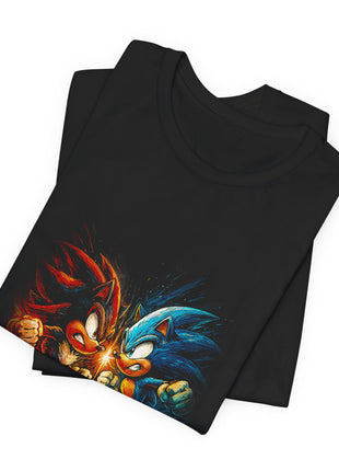 Folded black T-shirt close-up of Shadow and Sonic’s faces and clenched fists around a bright central burst.
