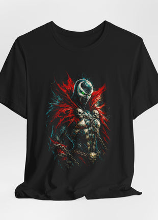 Draped front view of a black T-shirt showing Spawn’s upright portrait with chains across his chest and waist.