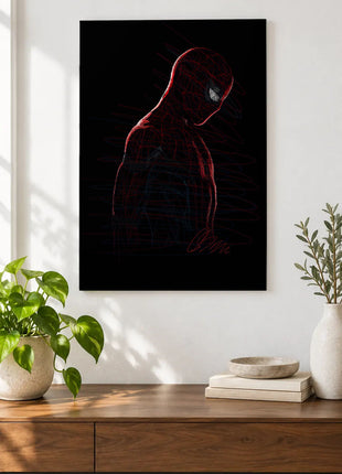 Spider-Man in Red Silence acrylic wall art displayed above a wooden console with plants and books against a white wall.
