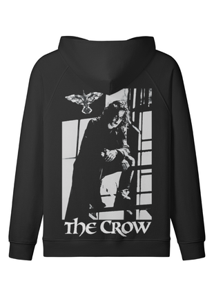 Back of the black The Crow Window Shadows hoodie with the black-and-white Eric Draven window scene and white title lettering beneath the lowered hood.