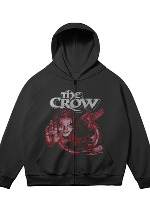 Alternate front view of The Crow Raised Hand zip-up hoodie with the hood open and the red-and-gray artwork centered across the zipper.