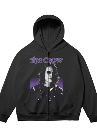 Alternate front view of the black The Crow Violet Shadows zip-up hoodie, with the monochrome Eric Draven portrait, violet title lettering and purple backdrop and sleeves angled outward.