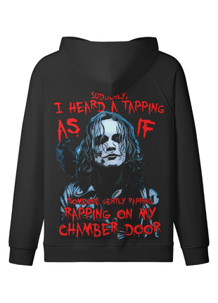 Back of the black The Crow Chamber Door hoodie with the blue-gray Eric Draven portrait and red chamber door quote lettering beneath the lowered hood.
