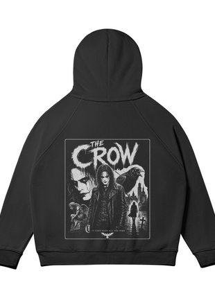 Flat back view of the black hoodie showing the framed Eric Draven monochrome collage below the hood.