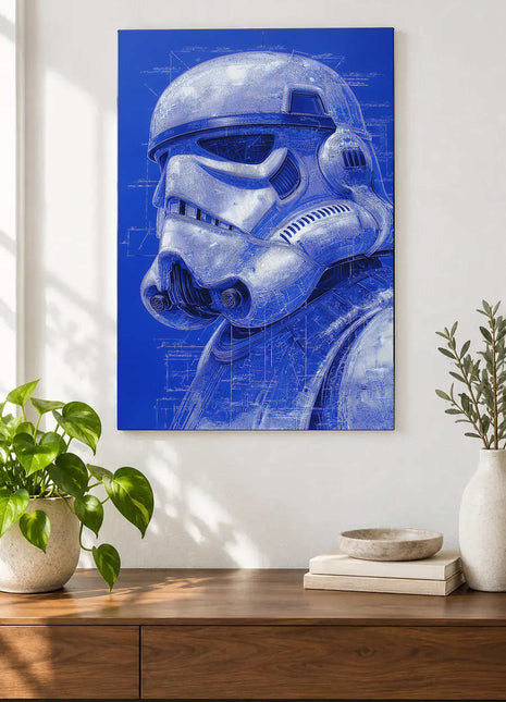 Stormtrooper Imperial Blueprints acrylic wall art displayed above a wooden console with plants and books against a white wall.