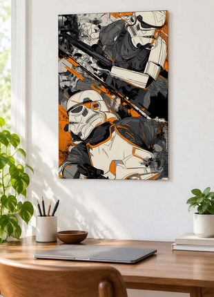 Stormtroopers Orange Crossfire acrylic wall art displayed above a wooden desk with a laptop, plants and books against a white wall.