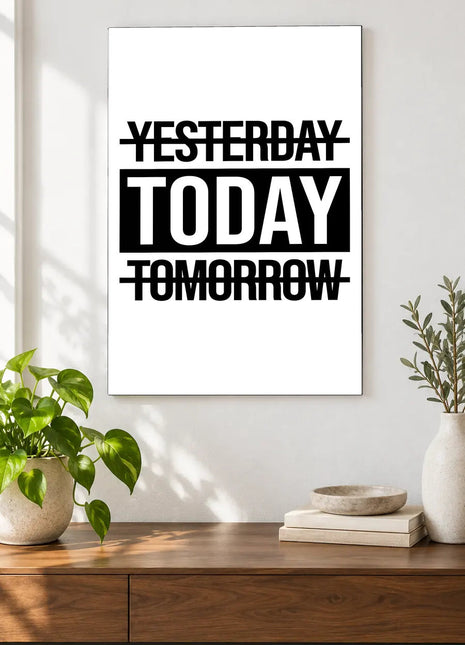 Today Takes the Spotlight acrylic wall art displayed above a wooden console with plants and books against a white wall.
