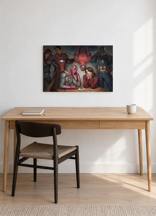 Vision and Scarlet Witch Table for Two acrylic wall art displayed above a wooden desk with a notebook, pencil and white mug against a white wall.