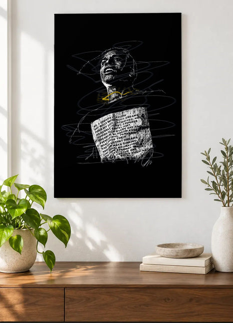 Words Across the Chest acrylic wall art displayed above a wooden console with plants and books against a white wall.