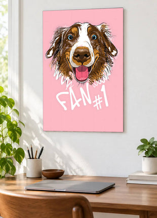 Happy brown-and-white dog with blue eyes above Fan #1 lettering on pink displayed above a desk in a room setting